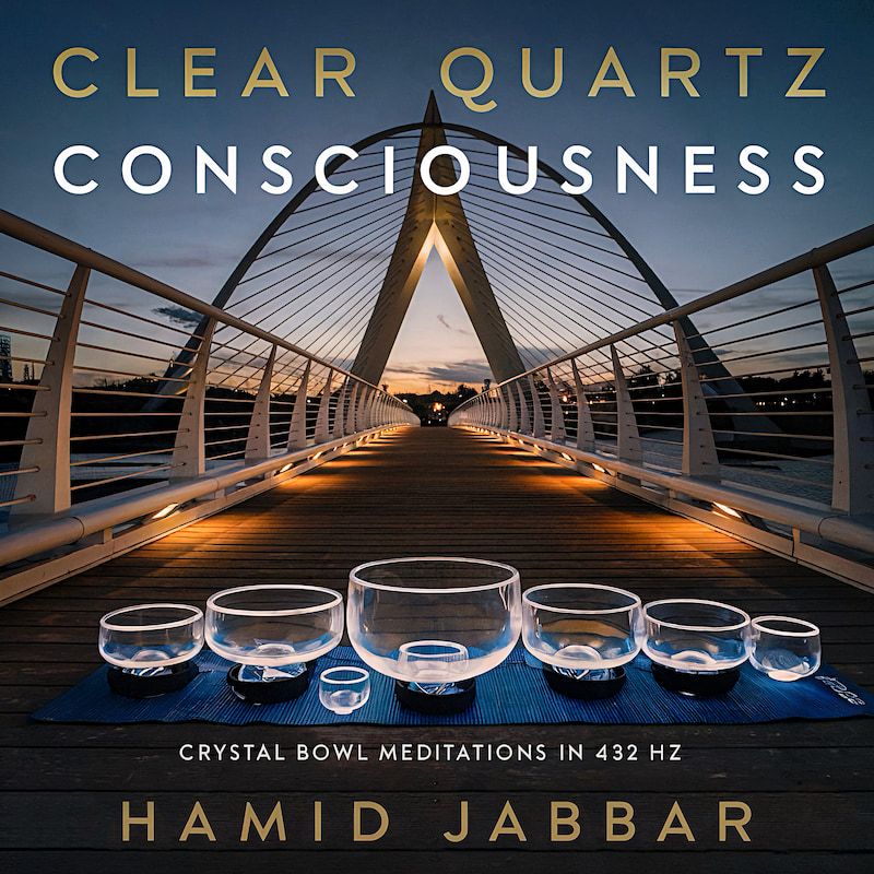 Cover art for Clear Quartz Consciousness, a row of clear crystal singing bowls on a blue mat on a lit pedestrian bridge at dusk